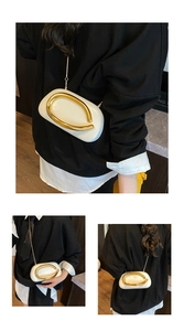 Detailed views of a white oval crossbody bag with gold metal handle and chain strap