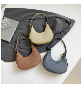 Detailed texture of woven shoulder bags in beige, coffee, and blue-grey colors