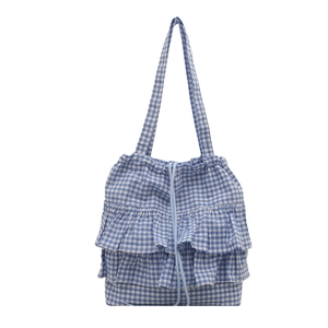 Blue and white gingham canvas tote bag with decorative ruffles and light blue drawstring
