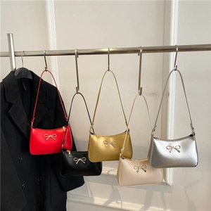 French bow shoulder bag set in red, black, gold, beige and silver faux leather
