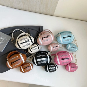 Rugby shaped handbag collection in six colors with chain straps and embossed texture