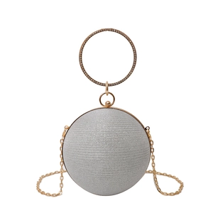 Chic silver spherical evening bag with rhinestone ring handle and gold chain strap