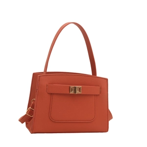 Elegant brick red Saffiano leather crossbody bag with golden turn-lock closure