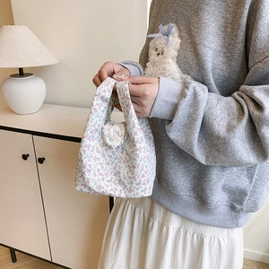 Floral canvas shoulder bag with lace heart detail and ribbon bow for women