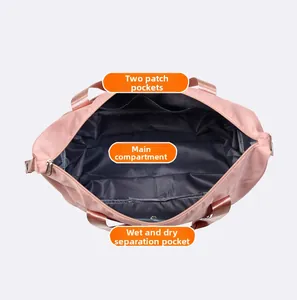 Internal view of pink travel bag showing main compartment and wet/dry separation pocket