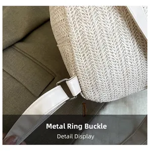 Close-up of durable silver D-ring hardware connecting the woven bag straps