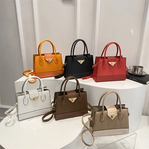 Fashionable tote bags in six colors with crocodile texture flap and triangle metal lock