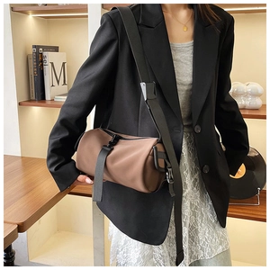 Brown frosted PU cylinder crossbody bag with adjustable wide black shoulder strap for women