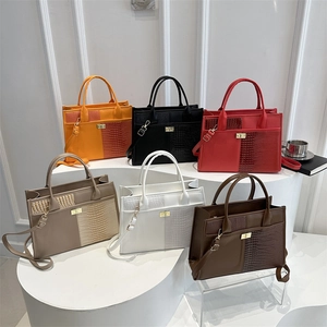 Chic multi-color crocodile pattern tote bag with gold lock and adjustable shoulder strap