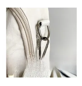 Detail showing durable gunmetal hooks and high-density nylon fabric of the large backpack
