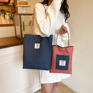 Denim and plaid canvas tote bags for women shown in a casual lifestyle setting