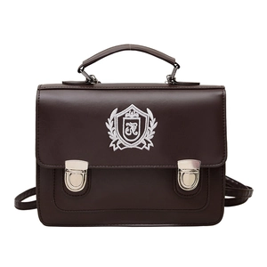 Classic British style dark brown faux leather messenger bag with embroidered crest badge