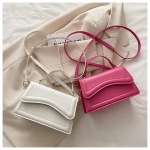 French style crossbody bags in pearl white and pink with curved quilted flap edges