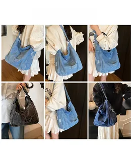 Close-up of distressed denim tote bags showing washed textures and frayed edge details