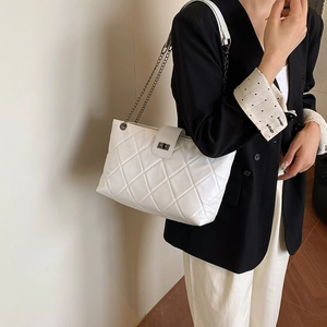 White quilted shoulder bag with chain strap and metallic lock for daily commute fashion