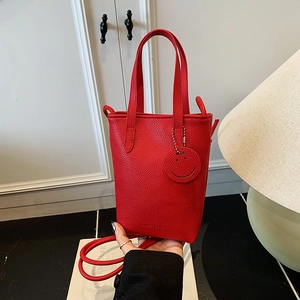 Women's Mini PU Leather Shoulder Bag Lychee Pattern Tote Handbag With Smiley Face Pendant Casual Minimalist Crossbody Bag