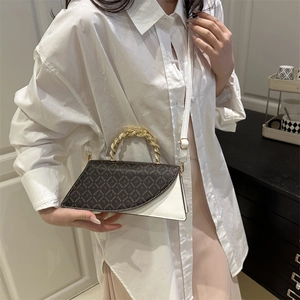 Classic brown monogram handbag with gold woven handle and white crossbody strap