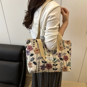 Borsa tote in tela con stampa floreale, trama jacquard e manici intrecciati donna
