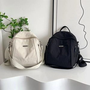 Chic nylon shoulder backpacks in cream and black with stylish wrinkled texture