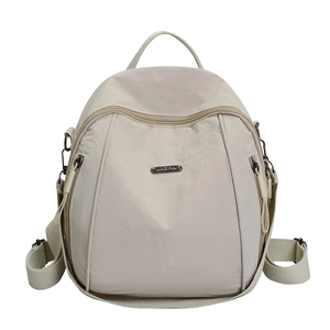 Lightweight beige nylon backpack for women with a minimalist waterproof fabric finish