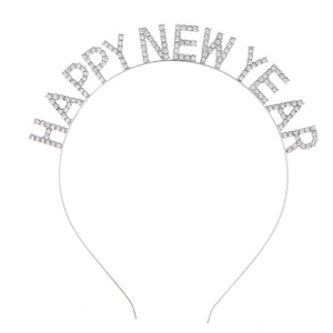 Macro shot of silver metal Happy New Year headband with sparkling crystal rhinestones