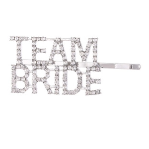 Close-up of Team Bride silver hair clip with sparkling crystals for wedding parties