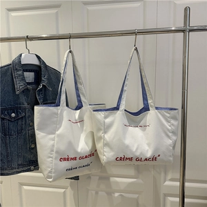 French retro canvas tote bag with embroidered letters and blue striped lining