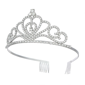 Detailed view of silver crystal crown with side combs for bridal hairstyle stability