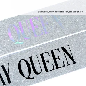 Close-up of sparkling silver sequin Birthday Queen sash with holographic laser lettering