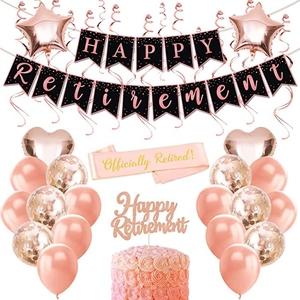 Detail of rose gold retired party set with sash, banner, balloons and cake topper