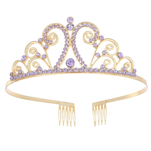 Golden bridal crown with purple crystals and side combs on a white background