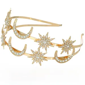 Detail of gold star and moon crown with sparkling crystals and a double-layered structure