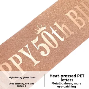 Detail of rose gold 50th birthday sash with high density glitter fabric and foil text