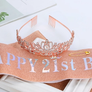 Detail of rose gold 21st birthday crystal tiara with combs and glitter sash set