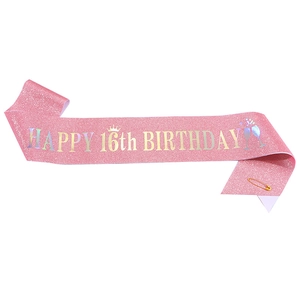 Sparkly pink glitter sash with Happy 16th Birthday lettering and golden safety pin