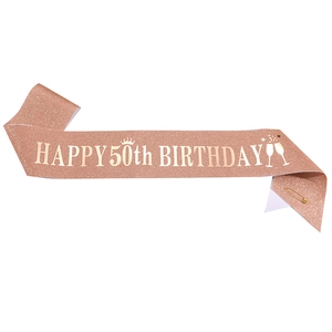 Rose gold glitter sash with Happy 50th Birthday text for party celebration decor