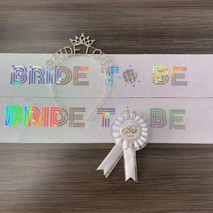 White lace Bride to Be bachelorette party kit with tiara, sash, and ribbon badge