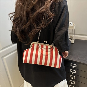 Chic red and white striped straw crossbody bag with vintage gold clasp and chain strap
