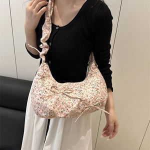 Floral hobo shoulder bag with bow detail and ruched strap for a trendy look