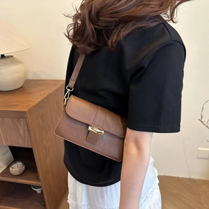 Brown crocodile embossed faux leather shoulder bag with gold twist lock for daily use