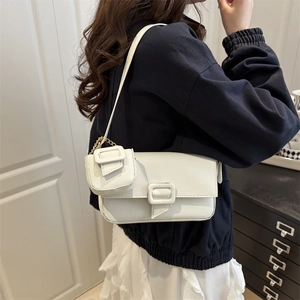 White lychee leather shoulder bag with matching mini pouch and gold chain details