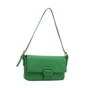 Minimalist bright green lychee leather crossbody bag with square buckle on white background
