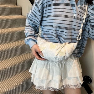 White lace croissant bag with yellow butterfly embroidery and delicate shoulder strap