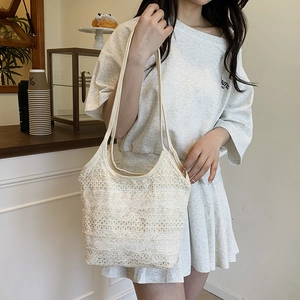 Chic cream white lace crochet tote bag with floral patterns for summer commute style