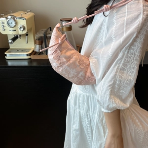 Pink crescent bag with lace embroidery and butterfly appliques for elegant daily style