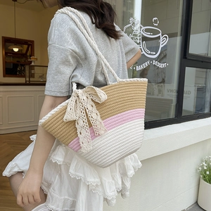 Three-color woven beach tote bag with large lace bow and cotton rope handles for women