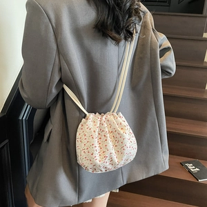 Large capacity floral canvas drawstring bucket bag with minimalist design for women
