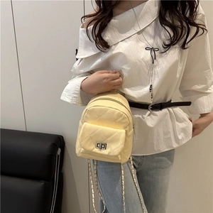Chic quilted beige leather mini backpack with metal chain straps and front flap pocket