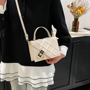 Chic quilted beige crossbody bag with gold metal clasp and chain detail for women