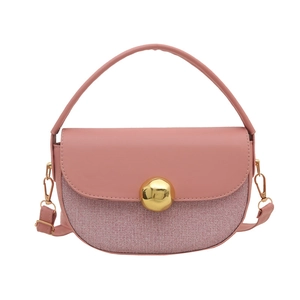 Pink semi-circle saddle bag with woven texture, golden ball lock and crossbody strap